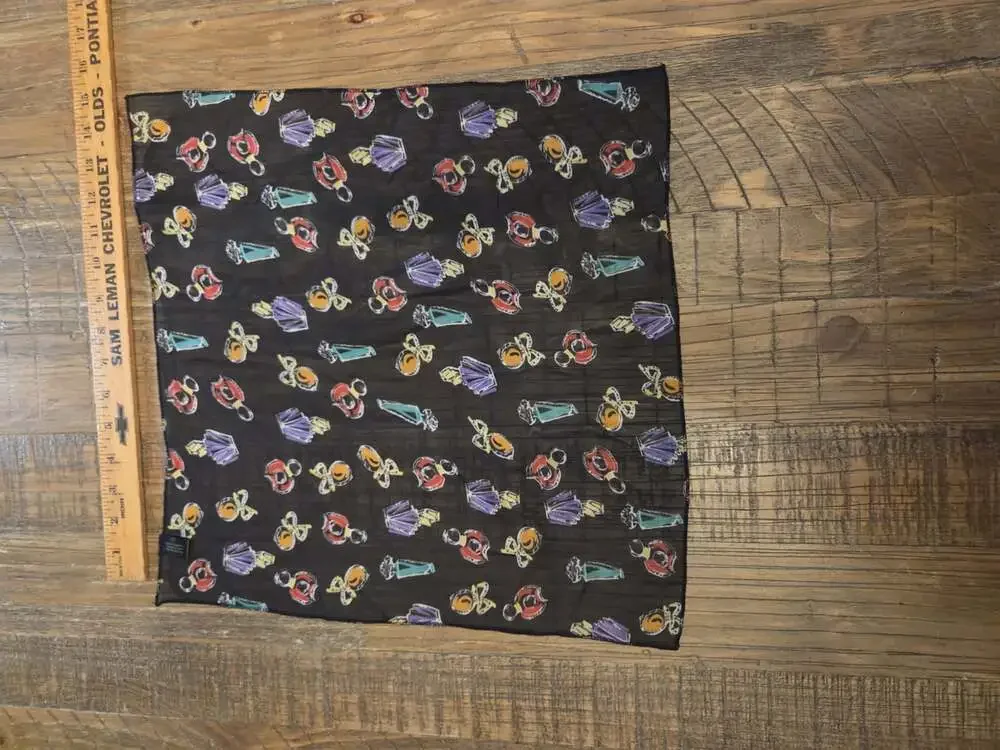 Elizabeth Taylor's Passion Nylon Scarf adorned with perfume bottles